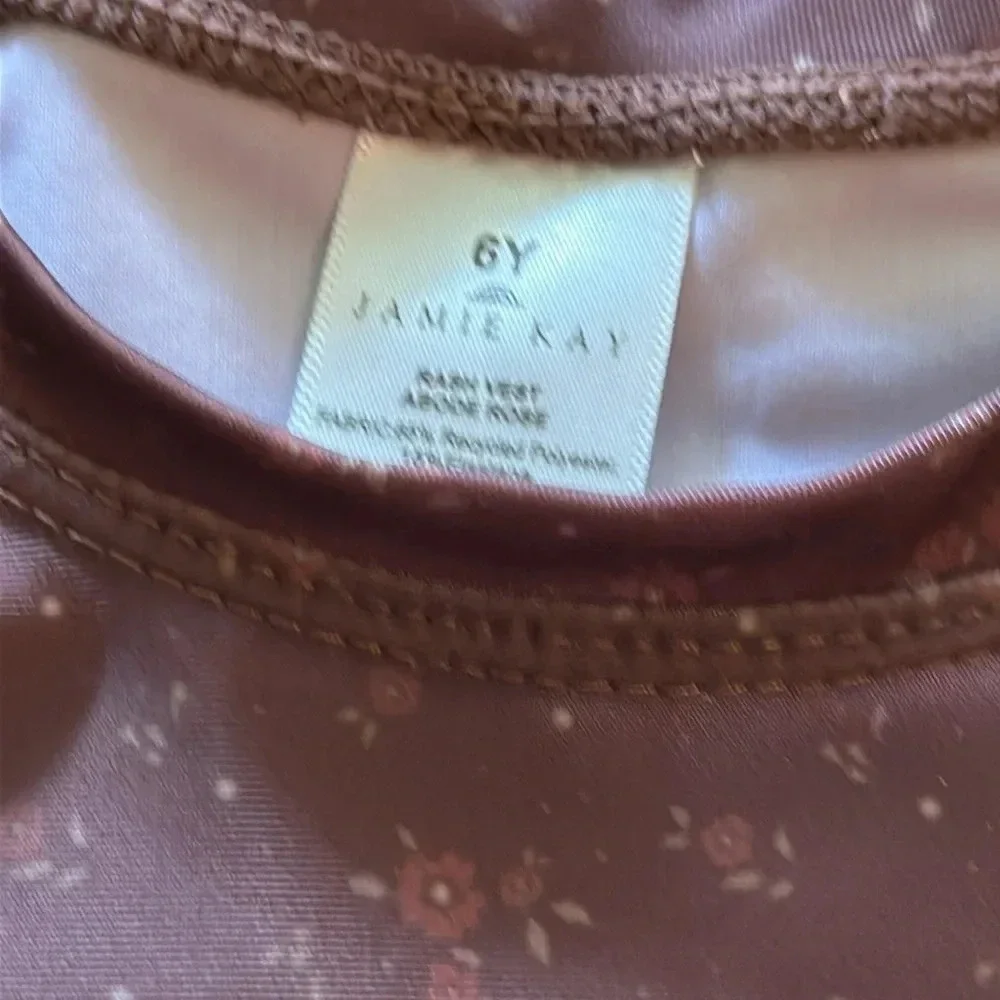 Jamie Kay sz 6 brown floral print rash guard never worn small thread flaw shown